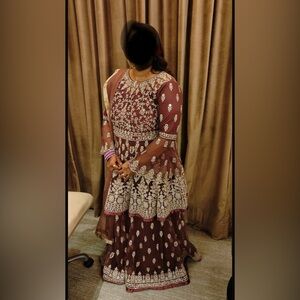 Ethnic Indian/Pakistani heavy Embroidery Sarara with Pepplum top.